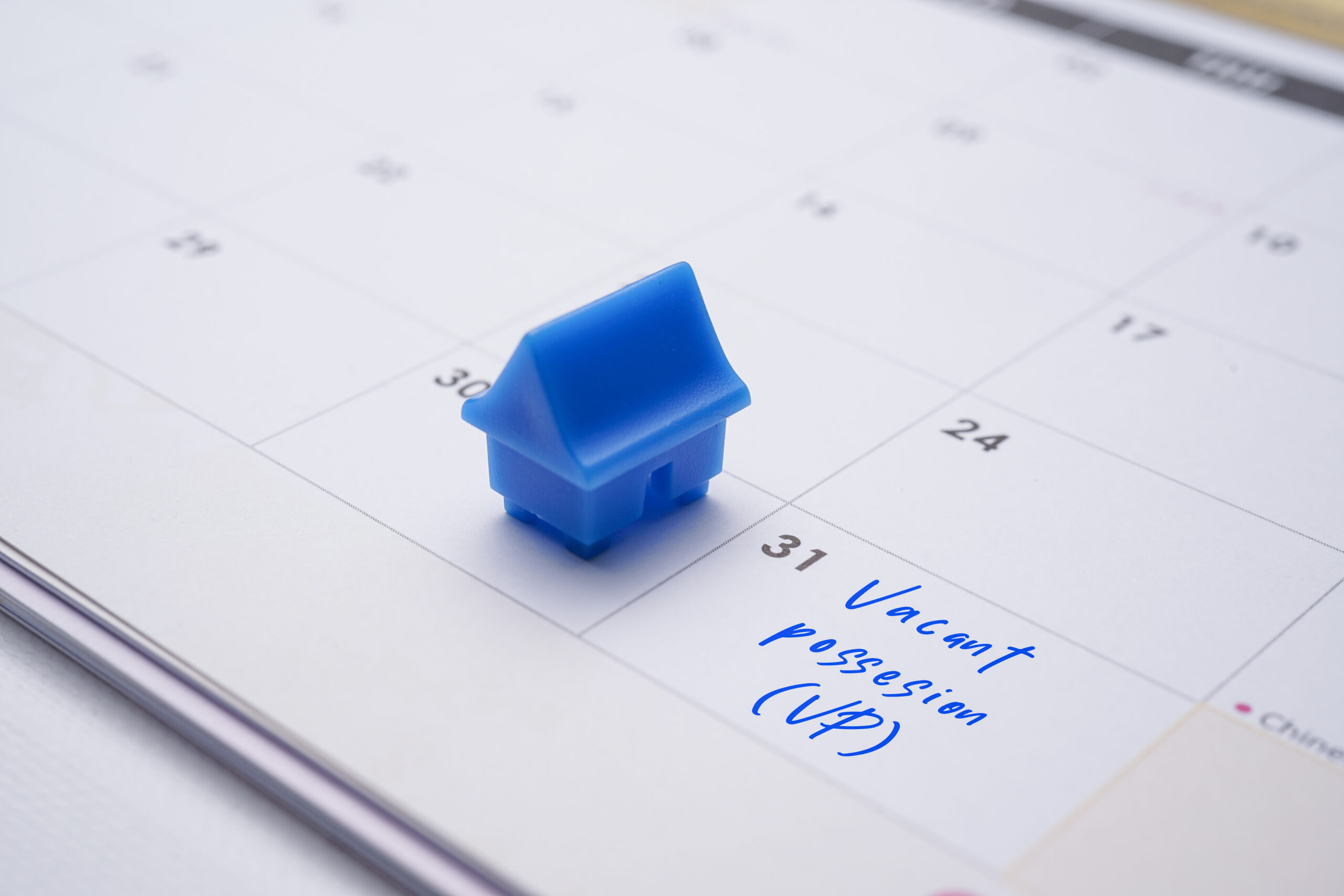 A Property conceptual, calendar with hand written vacant possession VP. The right of a purchaser to exclusive use of a property on completion of the sale
