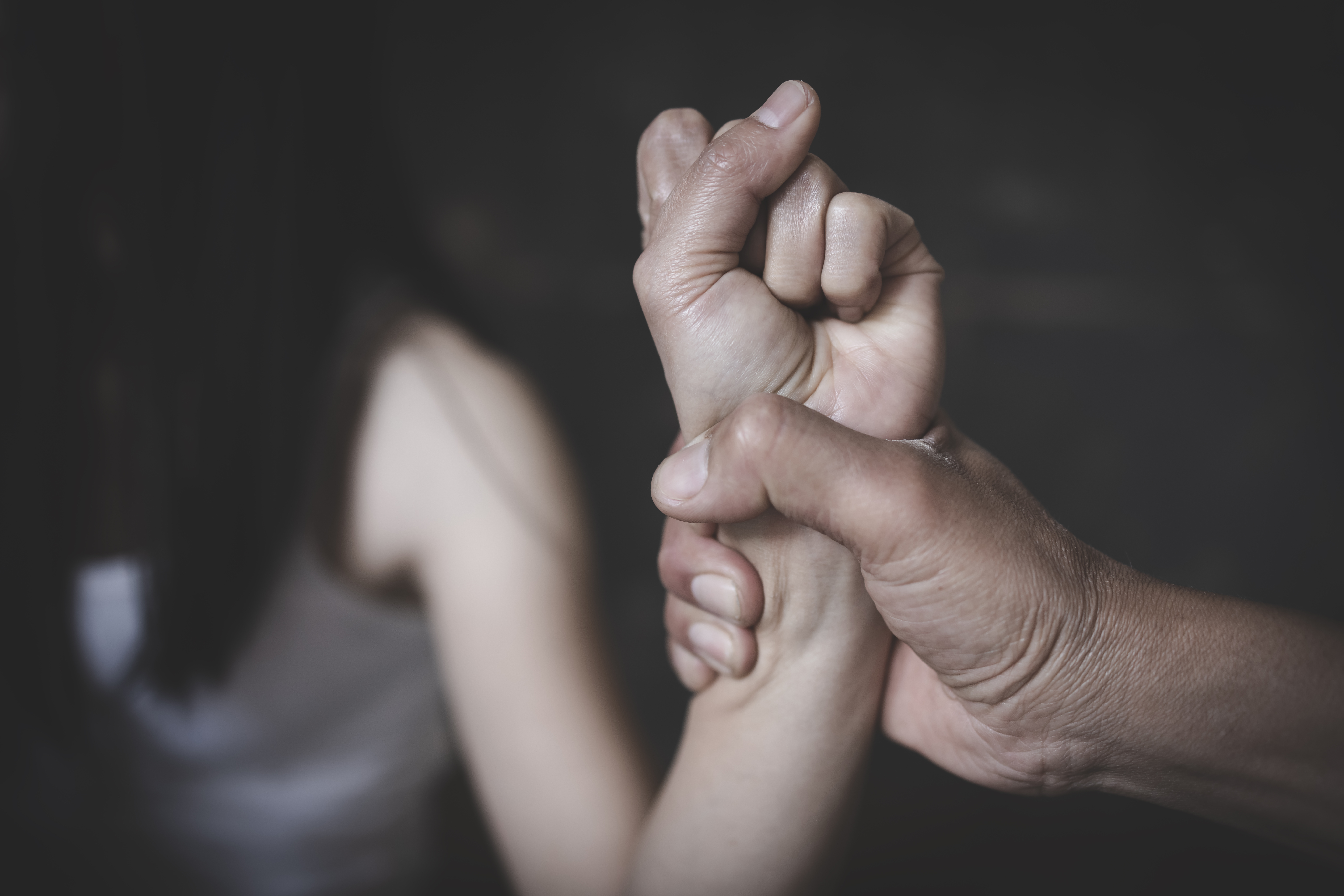 Woman victim of domestic violence and abuse. Husband intimidates